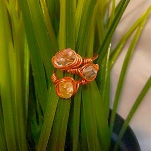 Prehnite crystal wrapped copper rings.